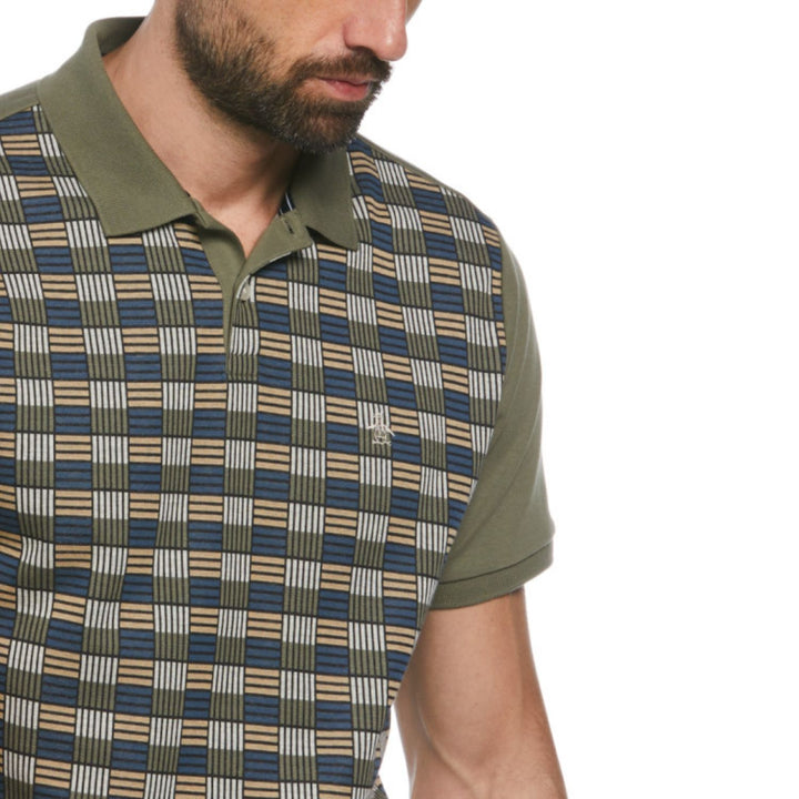 Polo jacquard con frente geométrico verde