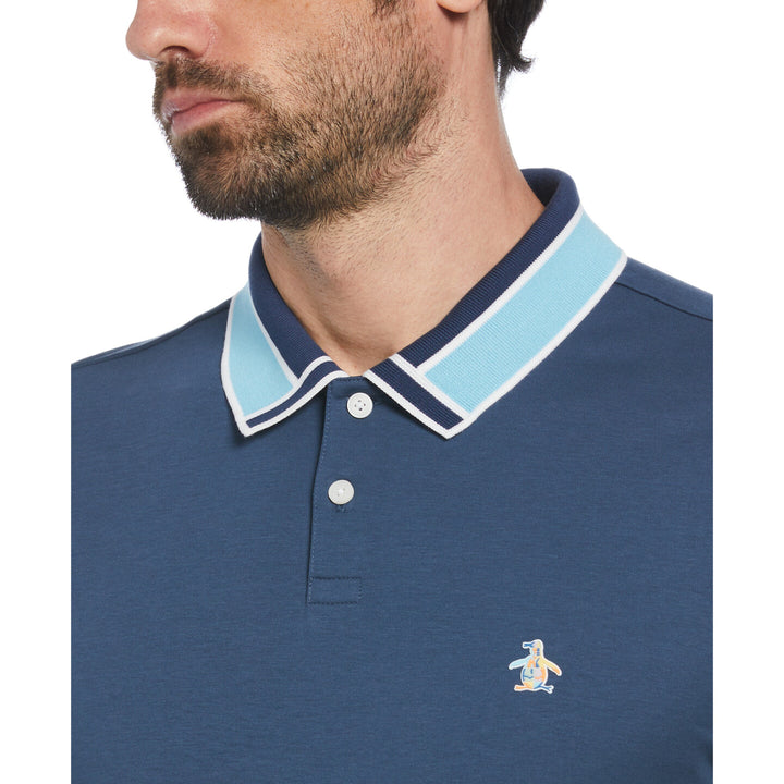 Polo algodón orgánico azul con ribete en el cuello