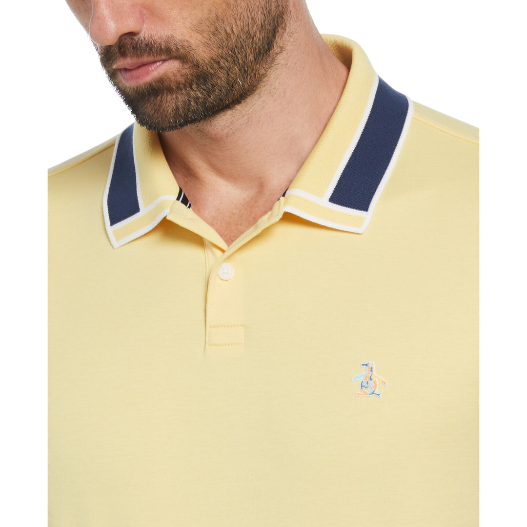 Polo algodón orgánico amarillo con ribete en el cuello