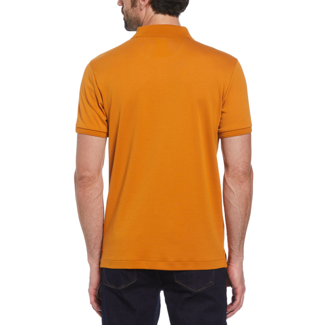 Polo Daddy interlock orgánico pegatina Pete naranja